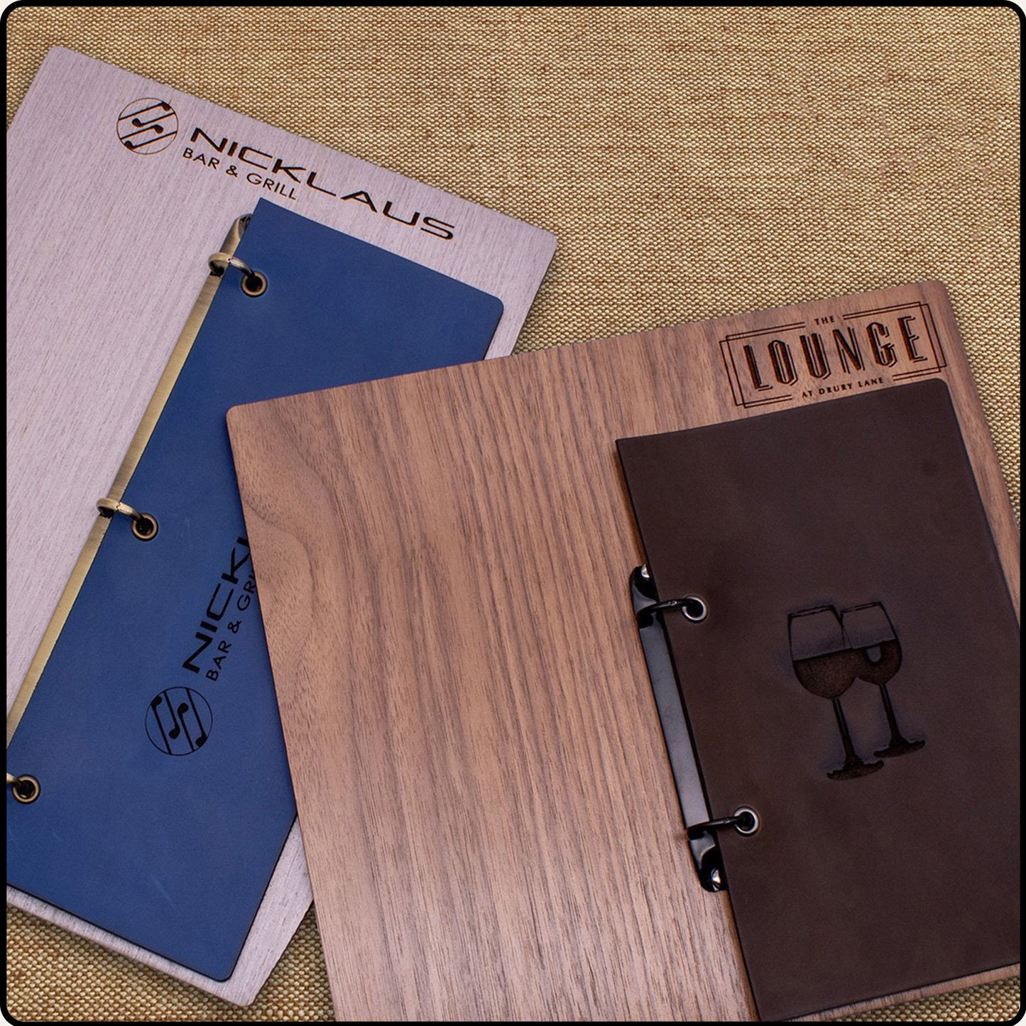 Wood menu board with centered binder rings