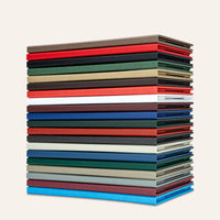 Stack of Arrestox linen menu covers in different colors